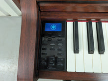 Load image into Gallery viewer, Yamaha Clavinova CLP-535 digital piano in mahogany stock #26276
