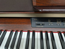 Load image into Gallery viewer, Yamaha Clavinova CLP-970 Digital Piano and stool in mahogany stock nr 26280

