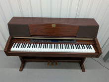 Load image into Gallery viewer, Yamaha Clavinova CLP-970 Digital Piano and stool in mahogany stock nr 26280
