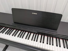 Load image into Gallery viewer, Yamaha Arius YDP-143 Digital Piano in satin black finish stock #26285
