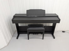 Load image into Gallery viewer, Roland RP102 digital piano and stool in satin black finish stock number 26290

