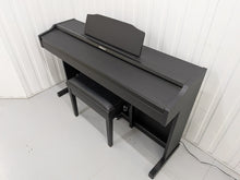 Load image into Gallery viewer, Roland RP102 digital piano and stool in satin black finish stock number 26290

