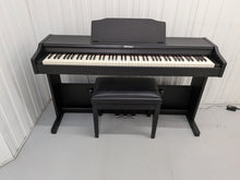 Load image into Gallery viewer, Roland RP102 digital piano and stool in satin black finish stock number 26290
