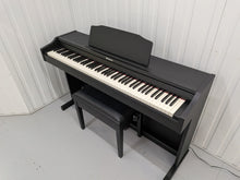 Load image into Gallery viewer, Roland RP102 digital piano and stool in satin black finish stock number 26290
