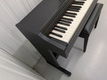 Load image into Gallery viewer, Roland RP102 digital piano and stool in satin black finish stock number 26290
