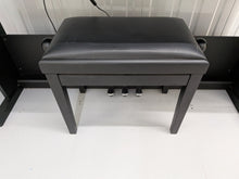 Load image into Gallery viewer, Roland RP102 digital piano and stool in satin black finish stock number 26290
