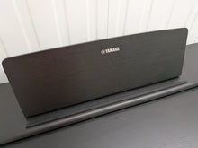 Load image into Gallery viewer, Yamaha Arius YDP-144 digital piano and stool in satin black stock #26286
