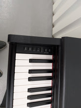 Load image into Gallery viewer, Yamaha Arius YDP-144 digital piano and stool in satin black stock #26296
