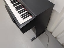 Load image into Gallery viewer, Yamaha Arius YDP-144 digital piano and stool in satin black stock #26296
