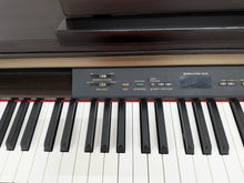 Load image into Gallery viewer, Yamaha Clavinova CLP-130 Digital Piano in rosewood stock number 26301
