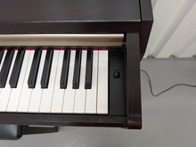 Load image into Gallery viewer, Yamaha Clavinova CLP-220 digital piano and stool in rosewood stock #26291

