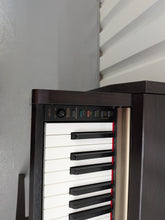 Load image into Gallery viewer, Yamaha Clavinova CLP-220 digital piano and stool in rosewood stock #26291
