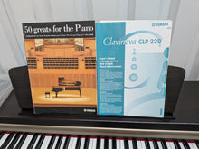 Load image into Gallery viewer, Yamaha Clavinova CLP-220 digital piano and stool in rosewood stock #26291
