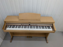 Load image into Gallery viewer, Roland HP-2e digital piano and stool in light oak finish stock number 26312
