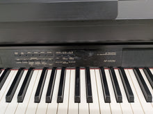 Load image into Gallery viewer, Casio Celviano AP-650M Digital Piano in satin black Full size . Stock no 26311
