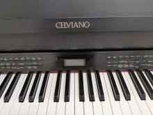 Load image into Gallery viewer, Casio Celviano AP-650M Digital Piano in satin black Full size . Stock no 26311
