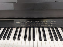 Load image into Gallery viewer, Casio Celviano AP-650M Digital Piano in satin black Full size . Stock no 26311
