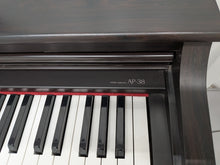 Load image into Gallery viewer, Casio Celviano AP-38 digital piano and stool in dark rosewood stock #26319
