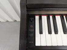 Load image into Gallery viewer, Yamaha Clavinova CLP-110 Digital Piano in dark rosewood stock #26326

