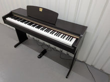 Load image into Gallery viewer, Yamaha Clavinova CLP-110 Digital Piano in dark rosewood stock #26321
