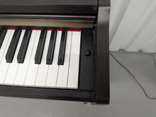 Load image into Gallery viewer, Yamaha Clavinova CLP-110 Digital Piano in dark rosewood stock #26321
