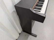 Load image into Gallery viewer, Roland HP101e Digital Piano in dark rosewood finish stock # 26337
