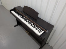 Load image into Gallery viewer, Roland HP101e Digital Piano in dark rosewood finish stock # 26337
