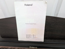 Load image into Gallery viewer, Roland HP101e Digital Piano in dark rosewood finish stock # 26337
