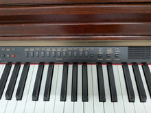 Load image into Gallery viewer, Yamaha Clavinova CLP-950 digital piano in mahogany stock #26358
