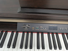 Load image into Gallery viewer, Yamaha Clavinova CLP-120 Digital Piano and stool in dark rosewood stock #26338
