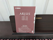 Load image into Gallery viewer, Yamaha Arius YDP-144 digital piano and stool in rosewood stock #26360
