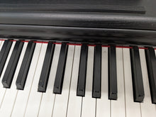 Load image into Gallery viewer, Yamaha Arius YDP-144 digital piano  in satin black stock #26374
