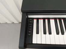Load image into Gallery viewer, Yamaha Arius YDP-142 Digital Piano + folding stool in satin black stock #26380
