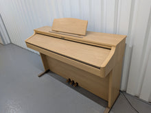 Load image into Gallery viewer, Roland HP102e digital piano in light oak finish stock number 26381
