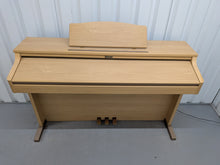 Load image into Gallery viewer, Roland HP102e digital piano in light oak finish stock number 26381
