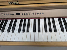 Load image into Gallery viewer, Roland HP102e digital piano in light oak finish stock number 26381
