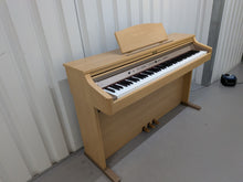 Load image into Gallery viewer, Roland HP102e digital piano in light oak finish stock number 26381
