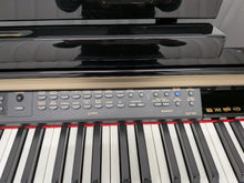 Load image into Gallery viewer, Yamaha Clavinova CLP-170PE Digital Piano glossy black polished ebony stock #26396
