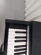 Load image into Gallery viewer, Yamaha Arius YDP-142 Digital Piano + stool in satin black stock #26404
