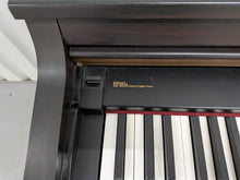 Load image into Gallery viewer, Roland HP103e digital piano and stool in dark rosewood finish stock number 26392
