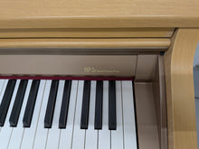 Load image into Gallery viewer, Roland HP-2e digital piano in light oak finish stock number 26393
