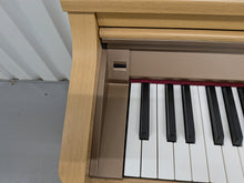 Load image into Gallery viewer, Roland HP-2e digital piano in light oak finish stock number 26393
