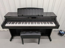Load image into Gallery viewer, Roland HP103e digital piano and stool in polished glossy black stock #26405

