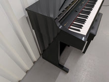 Load image into Gallery viewer, Roland HP103e digital piano and stool in polished glossy black stock #26405

