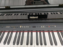 Load image into Gallery viewer, Roland HP103e digital piano and stool in polished glossy black stock #26405
