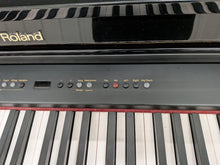 Load image into Gallery viewer, Roland HP103e digital piano and stool in polished glossy black stock #26405
