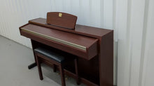 Load and play video in Gallery viewer, Yamaha Clavinova CLP-220 digital piano and stool in mahogany finish stock number 24340
