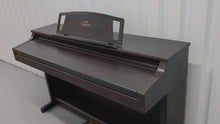 Load and play video in Gallery viewer, Yamaha Clavinova CLP-511 Digital Piano in dark rosewood finish stock # 24176
