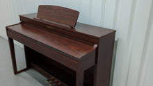 Load and play video in Gallery viewer, Yamaha Clavinova CLP-440 Digital Piano in mahogany stock no 25326
