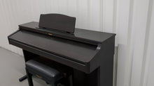 Load and play video in Gallery viewer, Roland HP-2e digital piano and stool in dark rosewood finish stock number 25317
